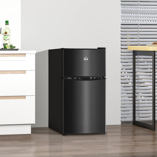 The small kitchen appliance placed on a wooden floor in a modern kitchen setting
