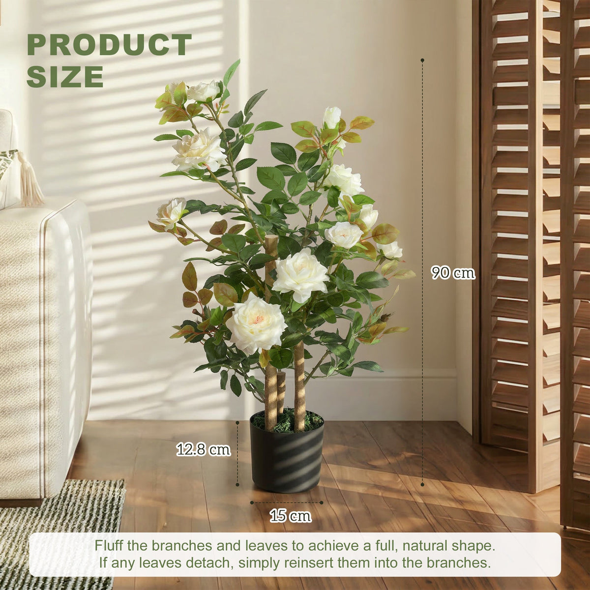 The artificial plant showing height and width dimensions against a neutral wall