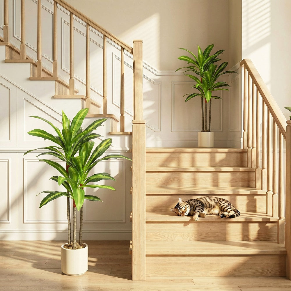 The artificial dracaena tree placed on a landing by a staircase
