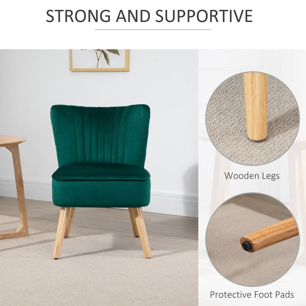Close up of the wooden legs and foot pads of the green fabric armchair