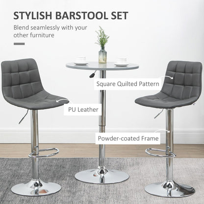 Close up of grey PU leather bar stools showing tufted pattern and chrome base