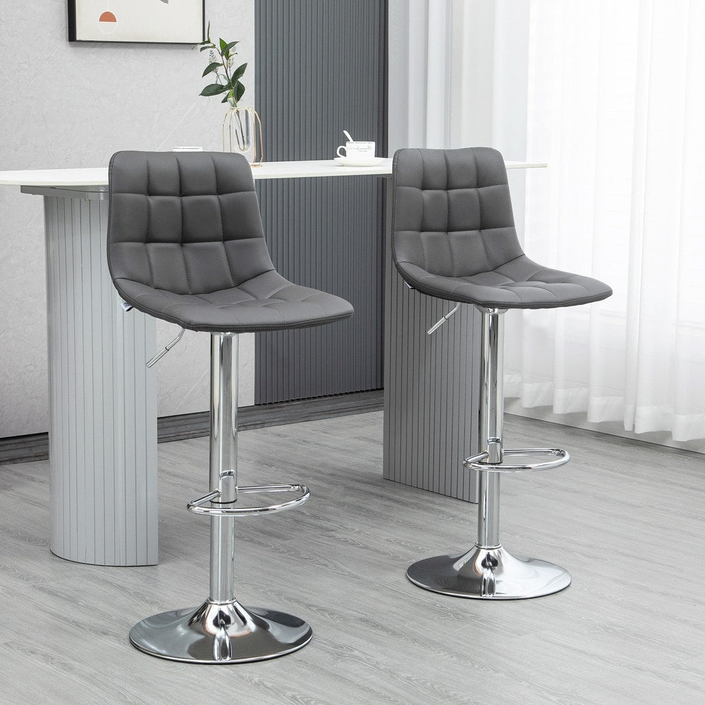 Two grey PU leather bar stools with chrome bases in a modern kitchen setting