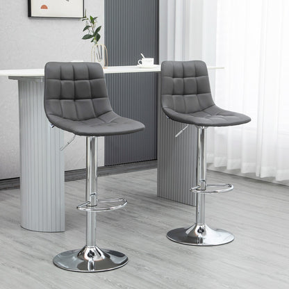Two grey PU leather bar stools with chrome bases in a modern kitchen setting