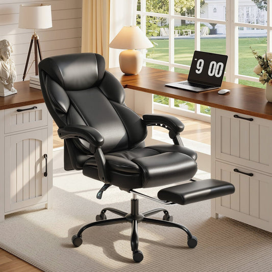 The black reclining computer desk chair with footrest set up in a home office room