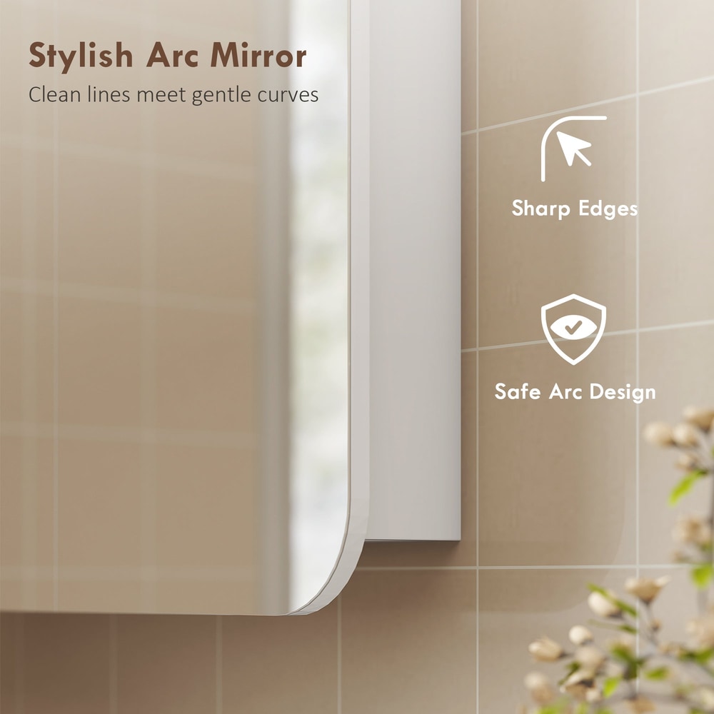 Close up of the arched bathroom mirror cabinet showing its rounded edges