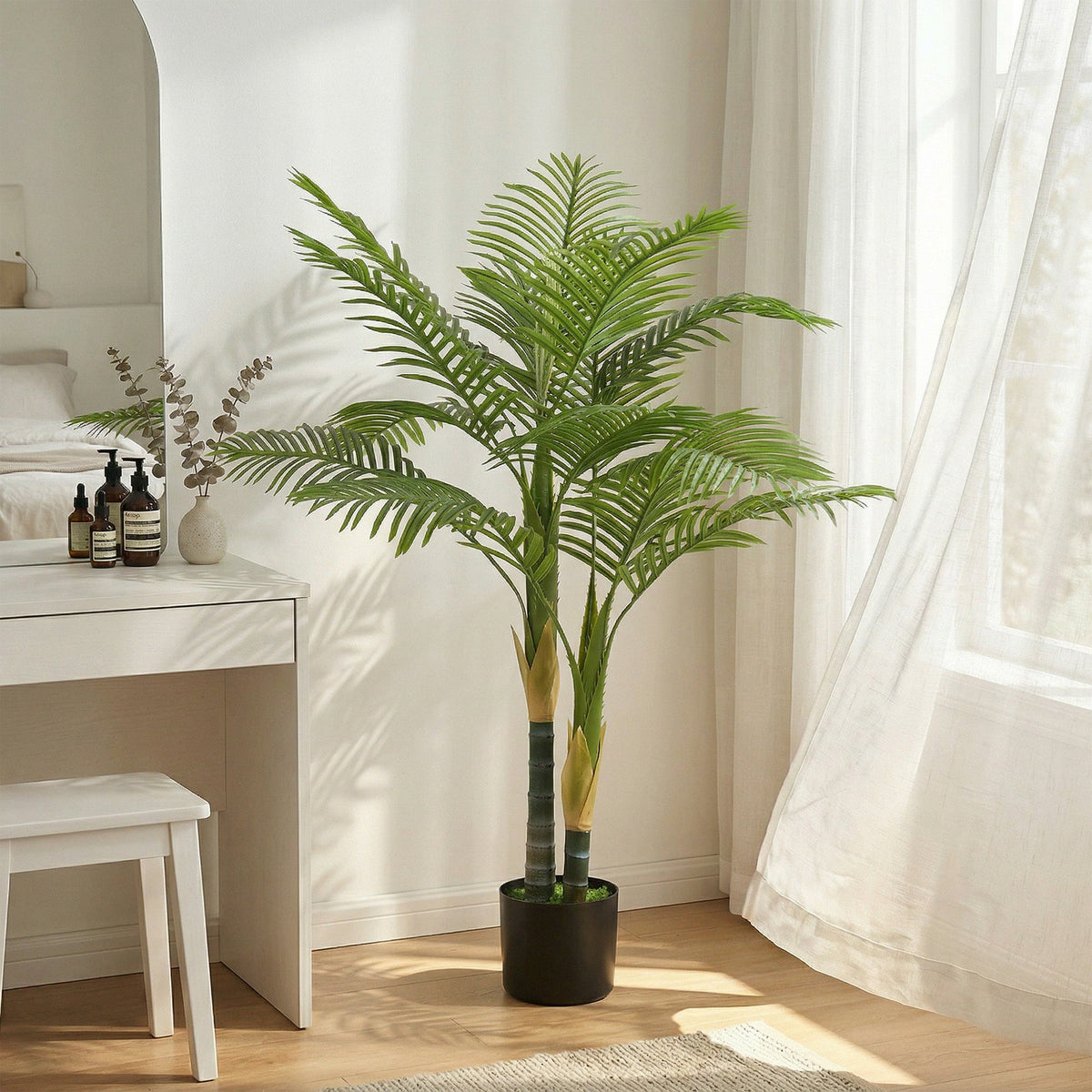 The decorative artificial plant placed in a bright room next to a dresser and a window