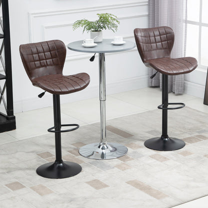 Two brown PU leather bar chairs with backrests in a room setting with a small table