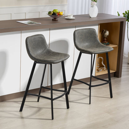 the dining stools placed in front of a kitchen counter in a bright room