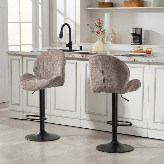 Two brown barstools with backrests placed at a kitchen island counter