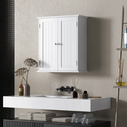 The white bathroom cabinet mounted on a wall above a sink, with toiletries and decor
