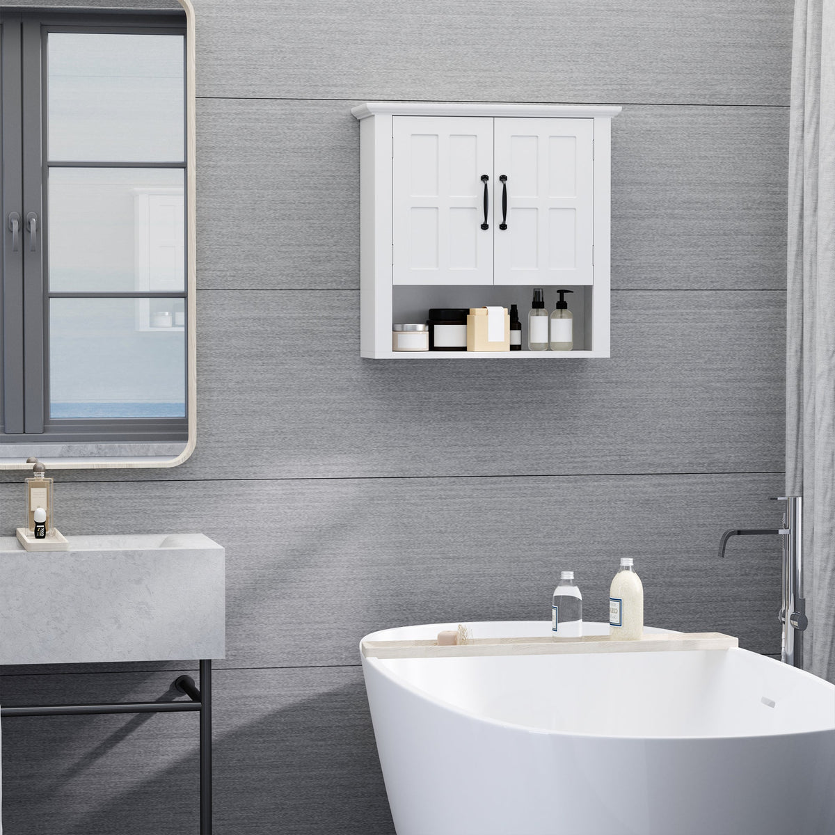The bathroom cabinet mounted on a grey wall above a bathtub with toiletries inside