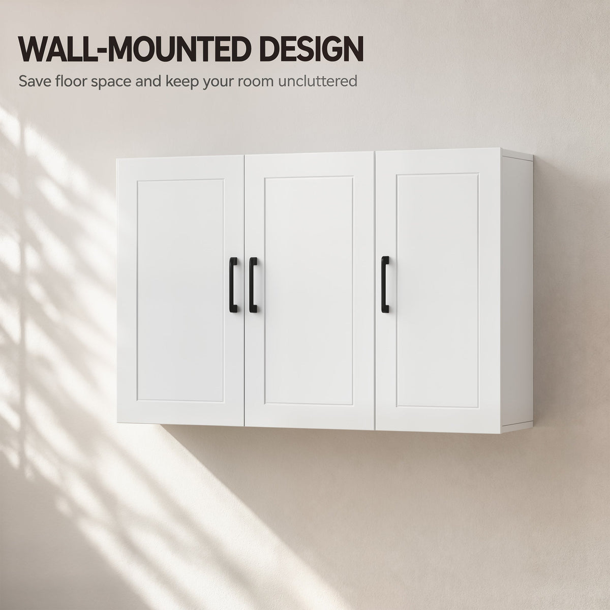 The wall mounted cabinet showing its clean white finish against a wall with shadows