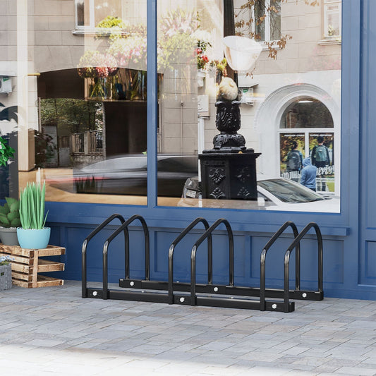 The black bicycle parking rack is shown outside a shop window