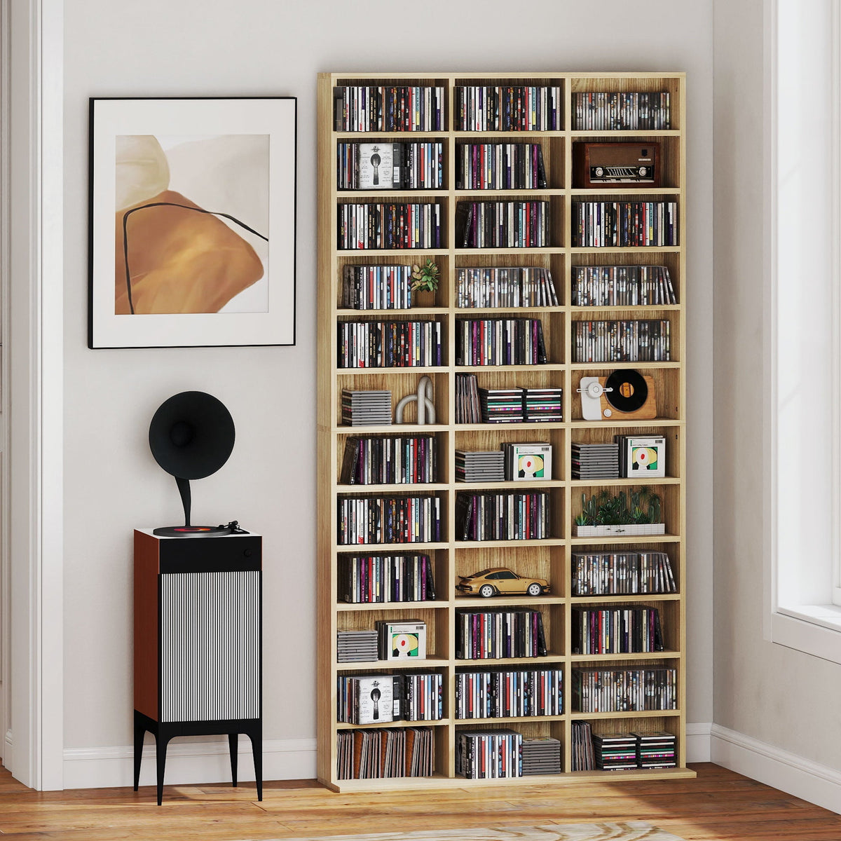 The CD storage unit filled with CDs and decorative items in a room setting