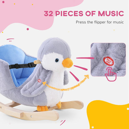 Close up of the musical button on the plush penguin rocker