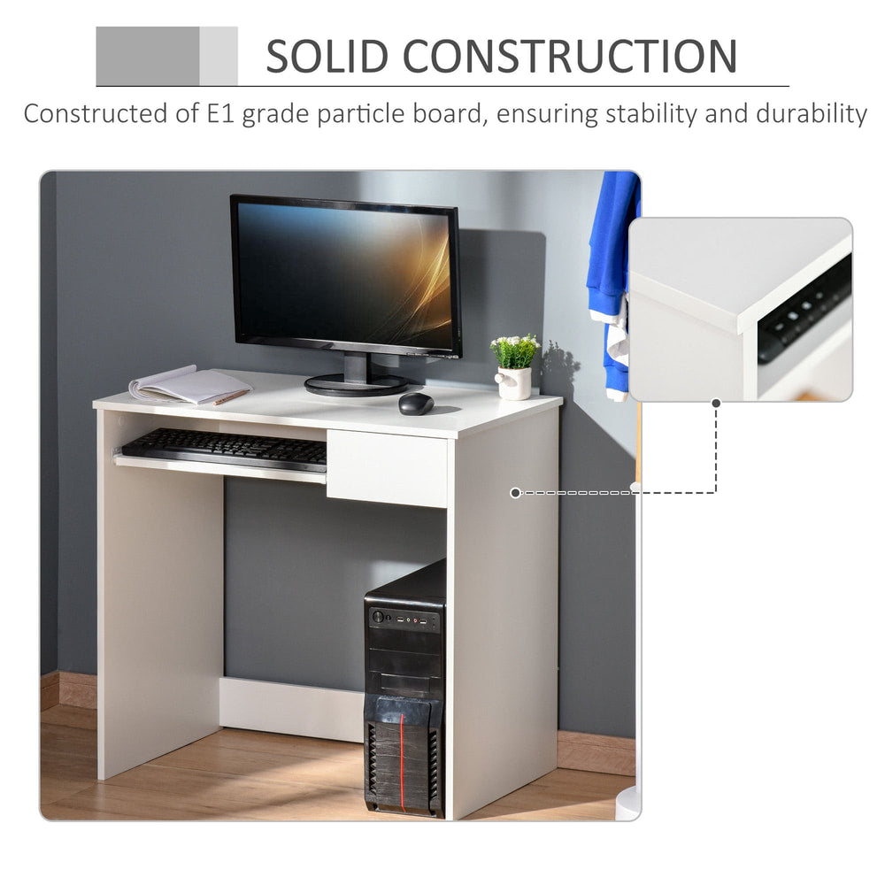 The compact computer desk with keyboard tray shown with a computer and desktop tower