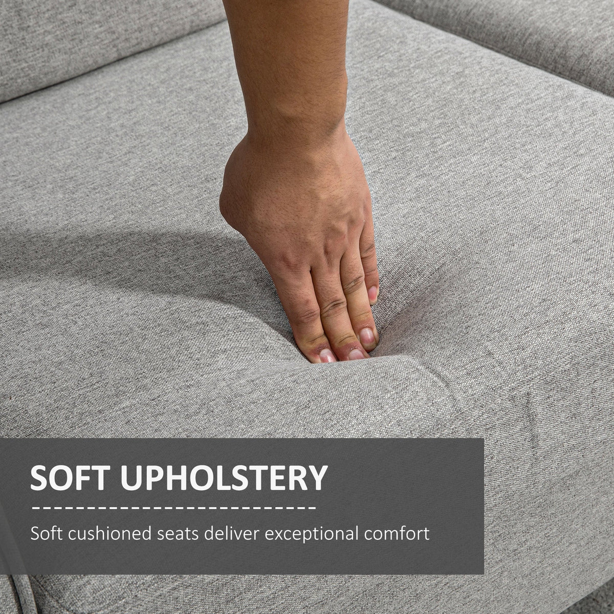 Close up of the soft cushioned seats of the light grey two seater sofa