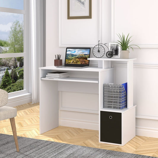 White computer desk with a laptop and accessories in a home office setting