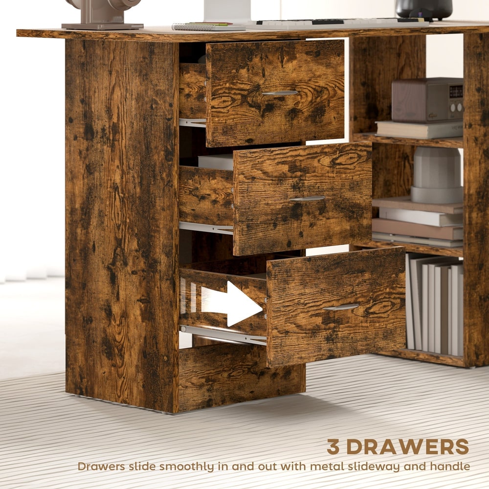 Close up of the three drawers on the computer desk, showing them open