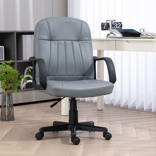 The office chair placed in a modern home office setting with a desk and wooden flooring
