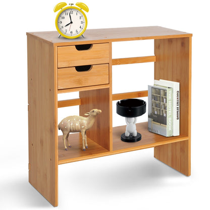 The desktop bookshelf reversed to show the drawers on the left side with various desk accessories
