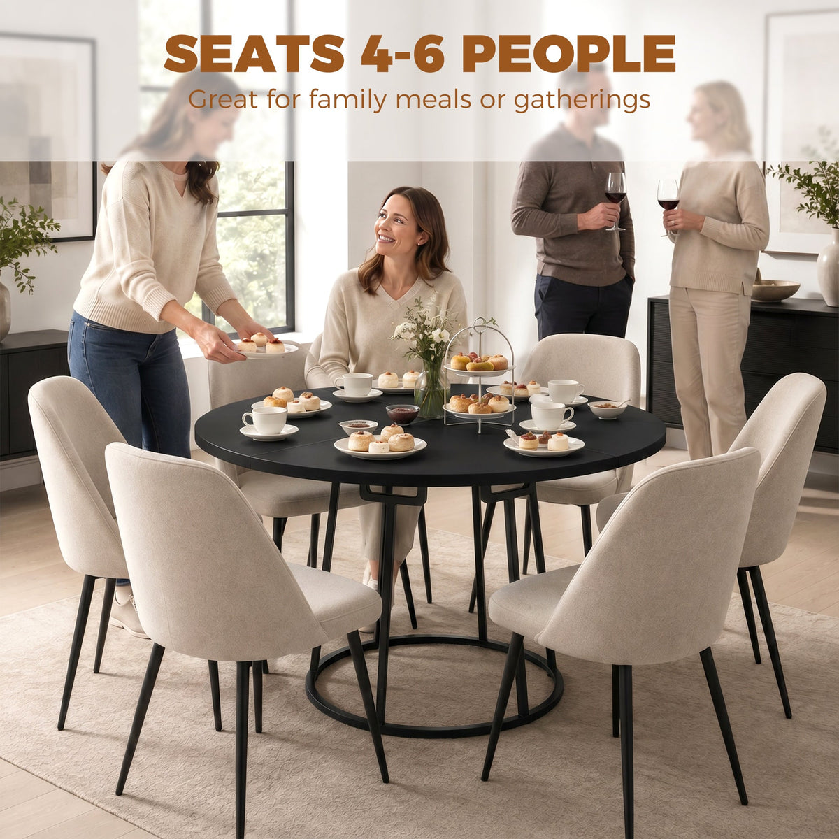 The dining furniture in a home setting with four people seated around it for a meal