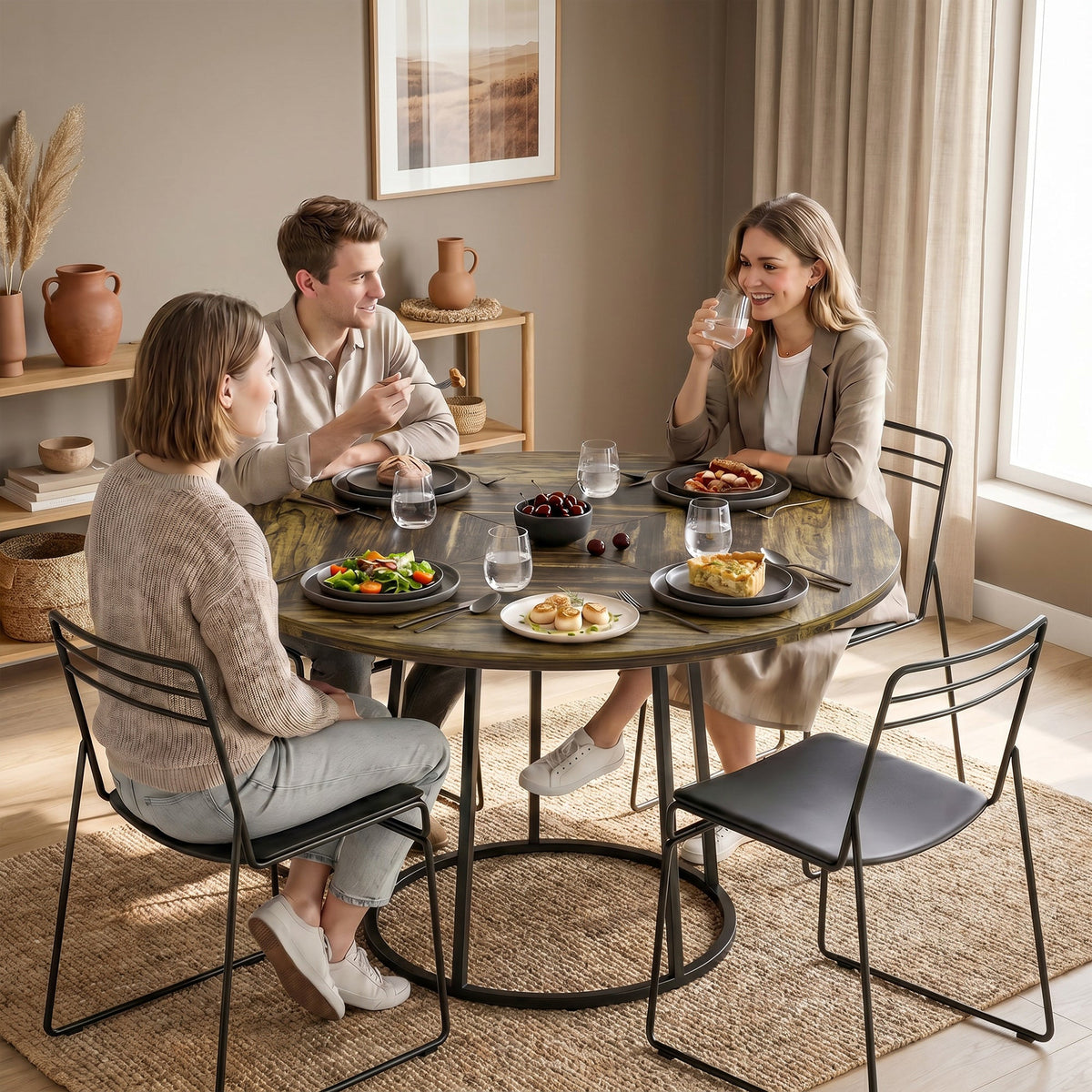 The dining table set for a meal with three people sitting around it in a bright living room