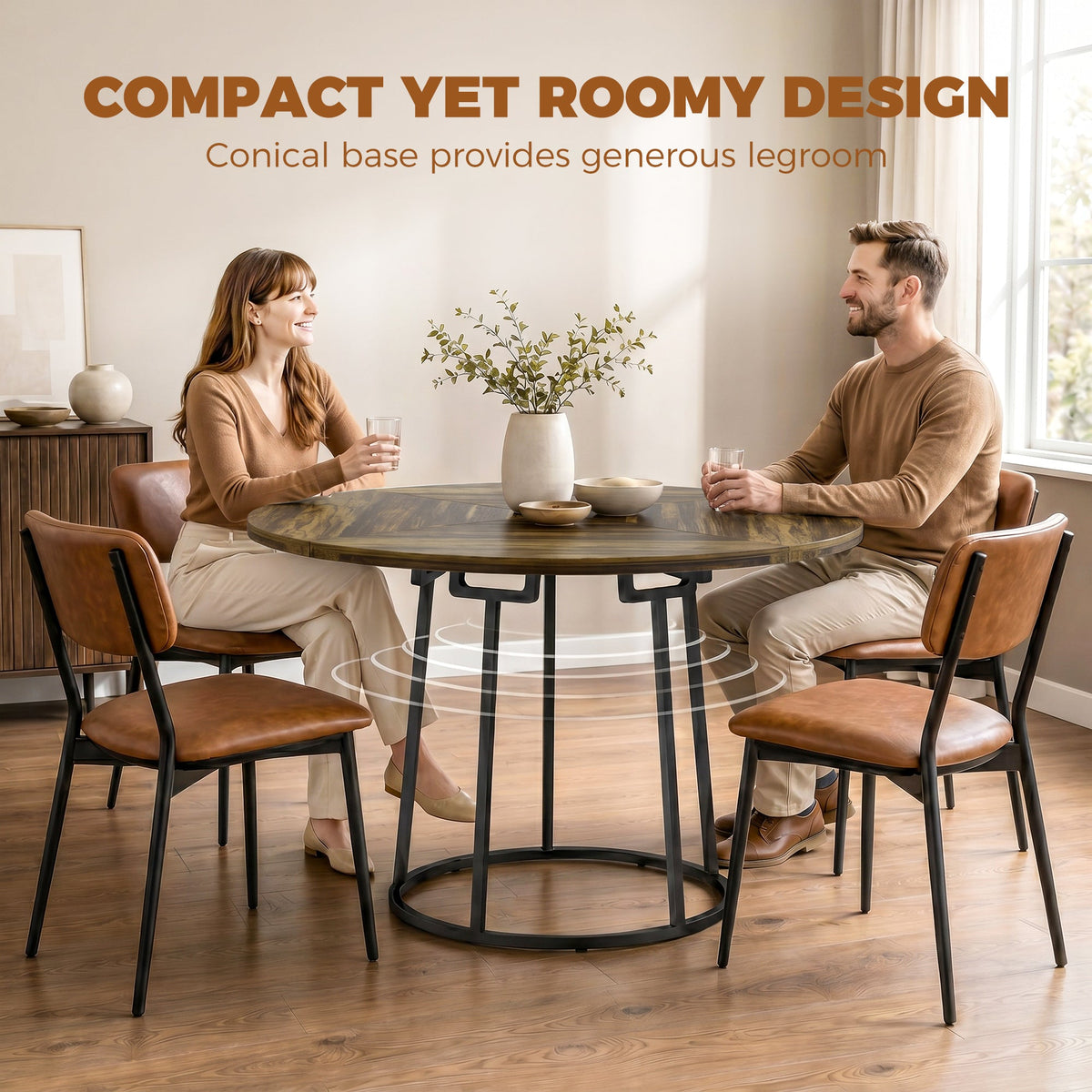 The dining table with two people sitting comfortably to show the legroom under the base