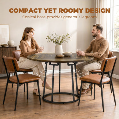 The dining table with two people sitting comfortably to show the legroom under the base