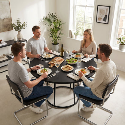 The dining furniture in a modern home with four people gathered around for a lunch