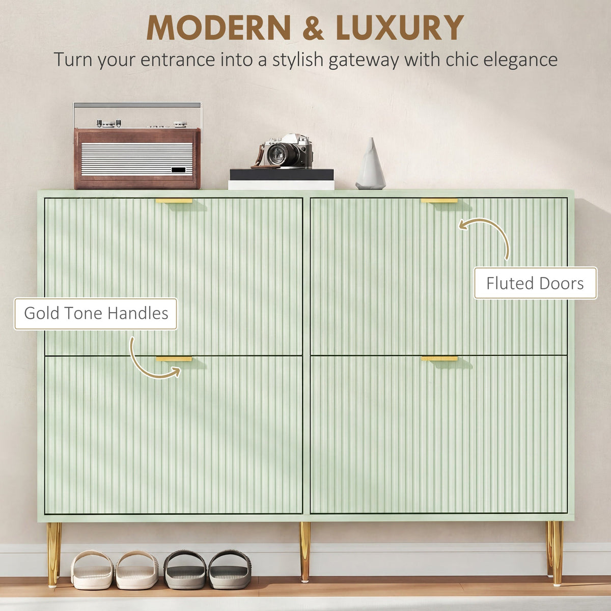Close-up of the light green four-drawer shoe storage cabinet with gold tone handles and fluted doors