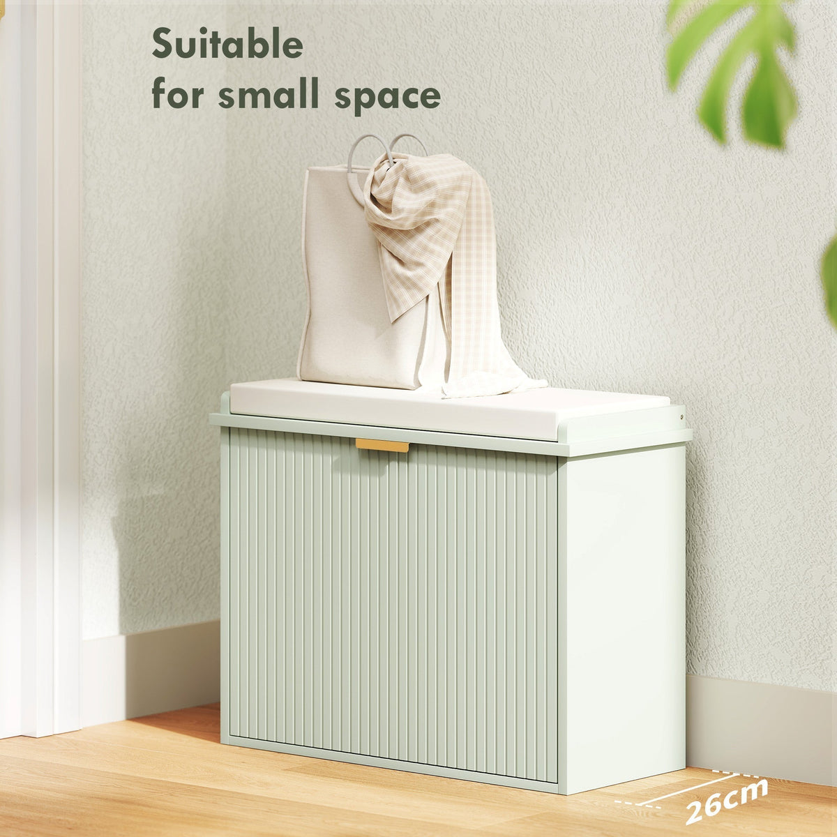 The shoe storage unit with the door closed and a bag placed on the padded seat