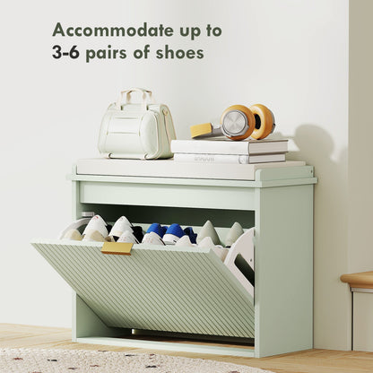 The shoe storage unit with the door open showing shoes stored inside and items on the seat