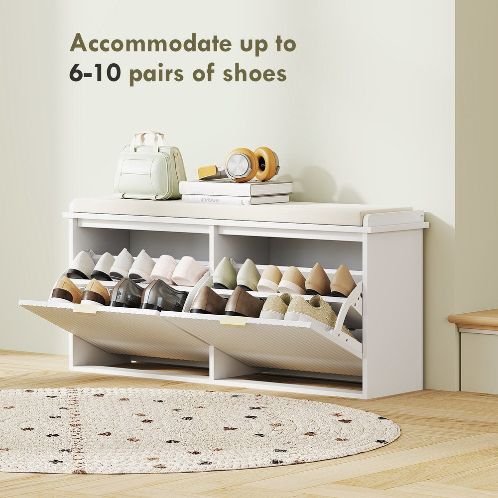 The shoe storage unit with multiple pairs of shoes displayed inside the open compartments