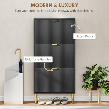 Black shoe storage cabinet with fluted doors and gold tone handles
