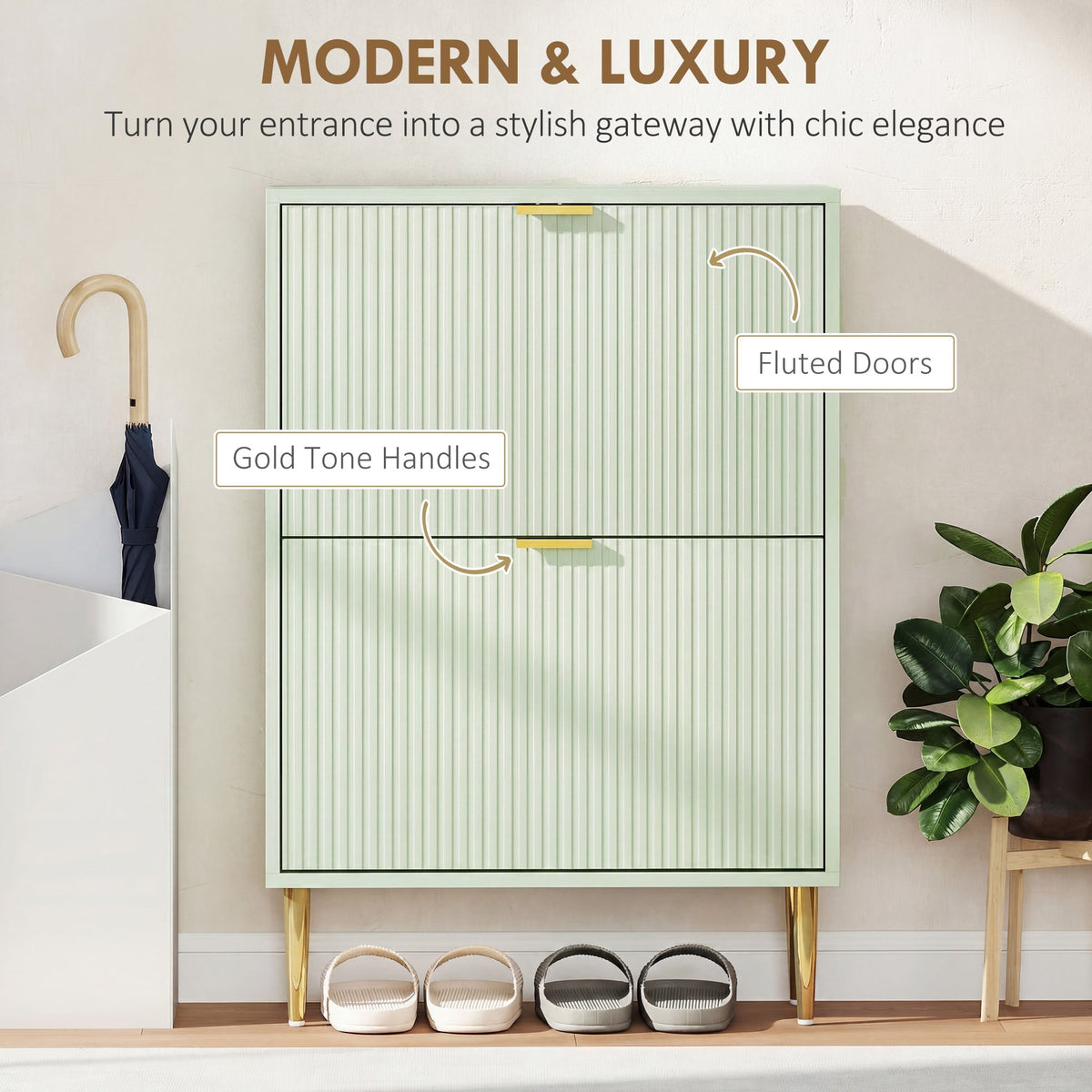 Close up of the light green shoe storage cabinet showing fluted doors and gold handles