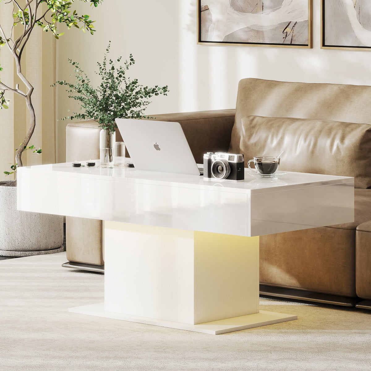 The coffee table placed in a living room with a laptop and camera on the surface