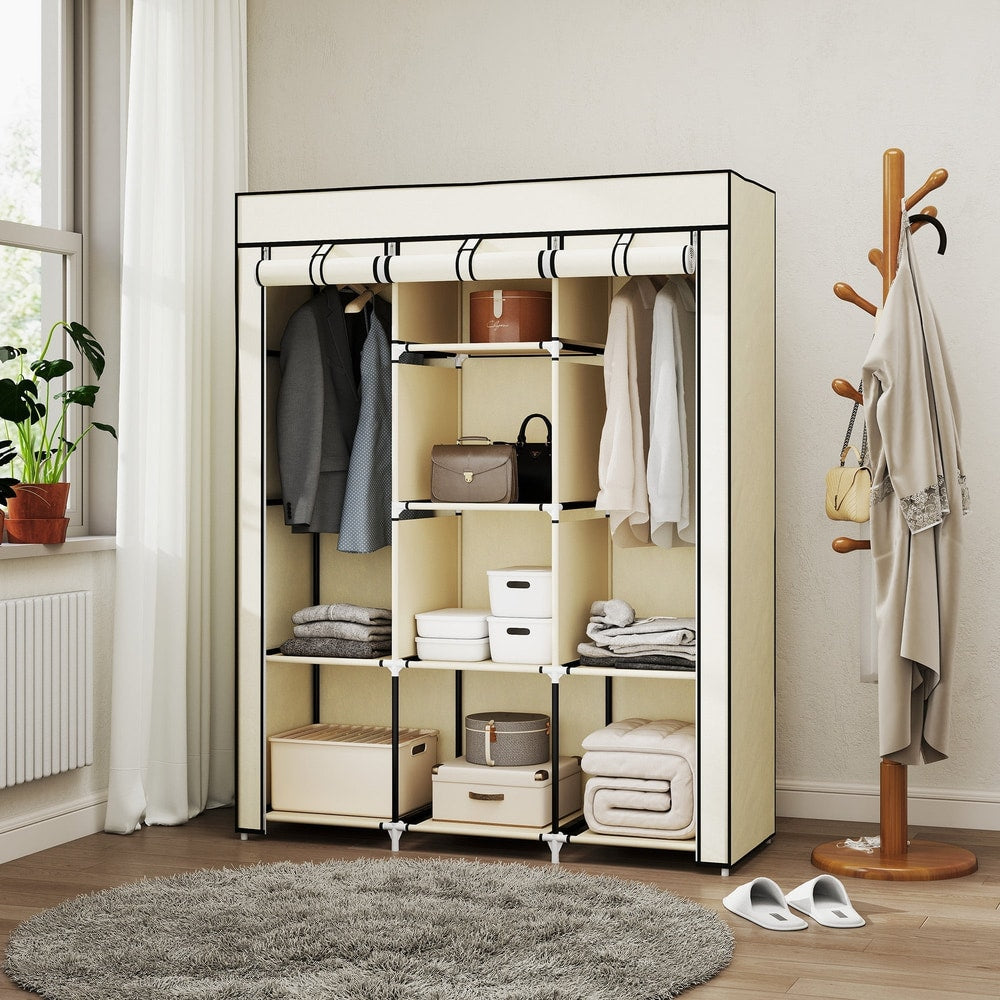 Cream white fabric wardrobe with clothes and storage boxes inside, shown in a bedroom setting