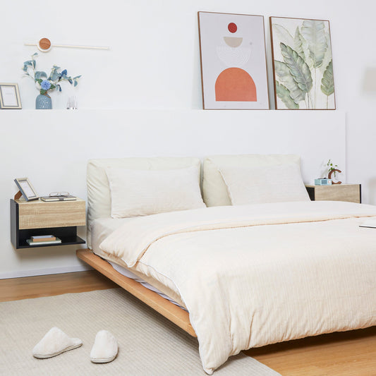 The storage cabinets mounted on a white wall next to a bed in a bright bedroom setting