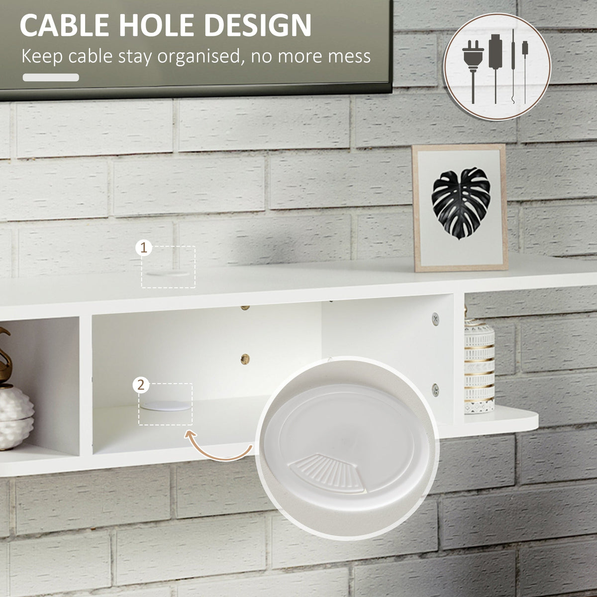 Close-up of the white wall-mounted media console showing cable management holes and shelf compartments