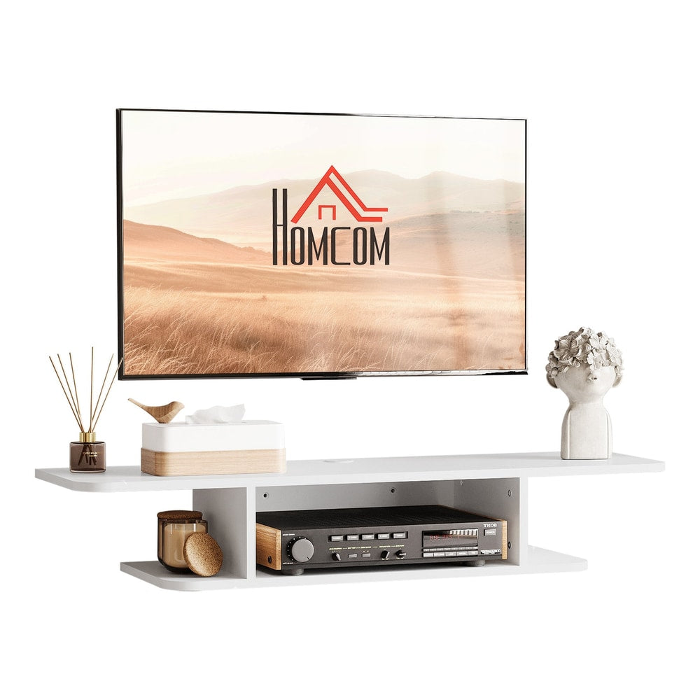 HOMCOM Floating TV Unit Stand, a white wall-mounted media console with a shelf and compartments, holding a TV and accessories