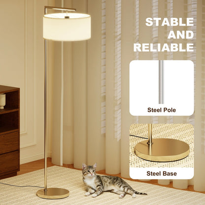 The silver pole and steel base of the modern floor lamp