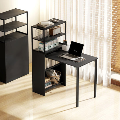 The black folding desk and shelf unit is shown assembled with a laptop and books on the desk surface