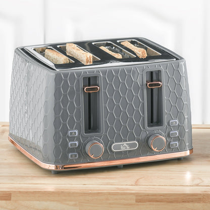 The grey four-slice toaster with toast popping up on a wooden worktop