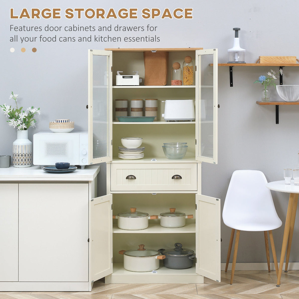 The kitchen furniture with its doors open showing storage space inside
