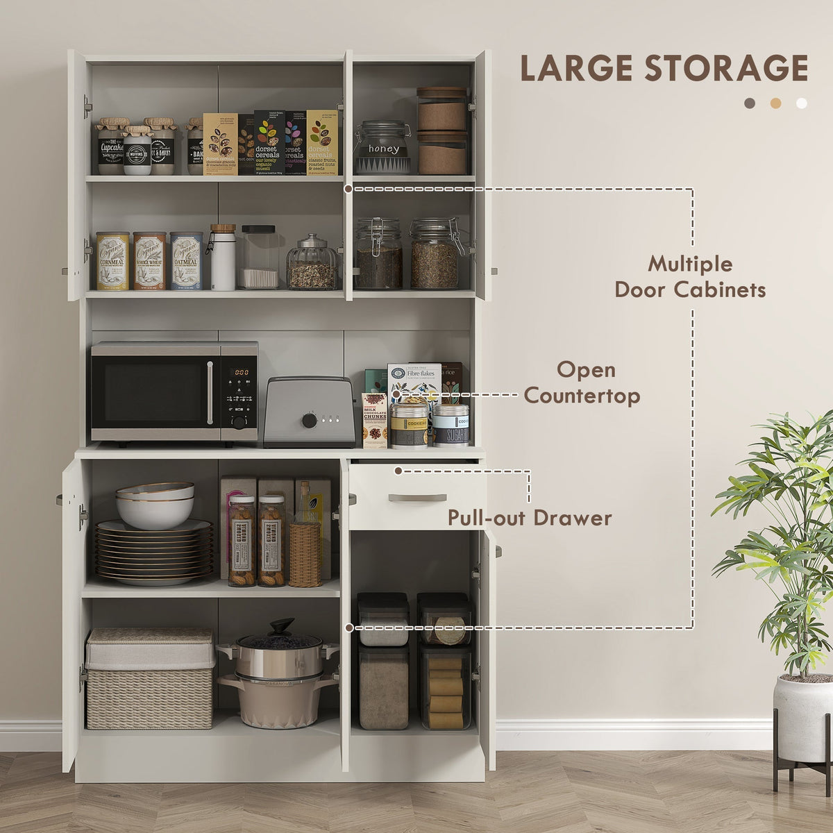 The kitchen furniture with all doors and the drawer open to show internal storage space
