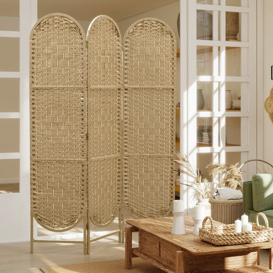 The three-panel room divider in a living room, set up behind a wooden coffee table