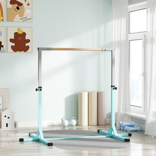 Kids gymnastics bar set up in a bright room with yoga mats and weights nearby