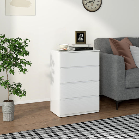 The white chest of drawers placed in a living room next to a grey sofa and a potted plant