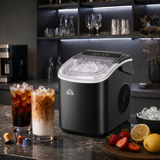 The portable ice maker sits on a kitchen counter next to iced coffees and fruit